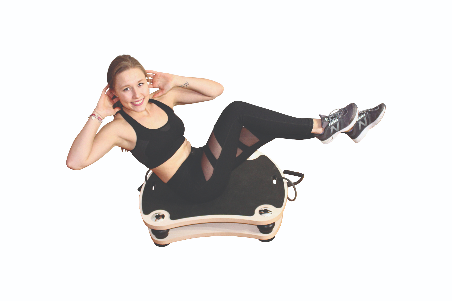 Woman doing a core exercise on a whole body vibration plate
